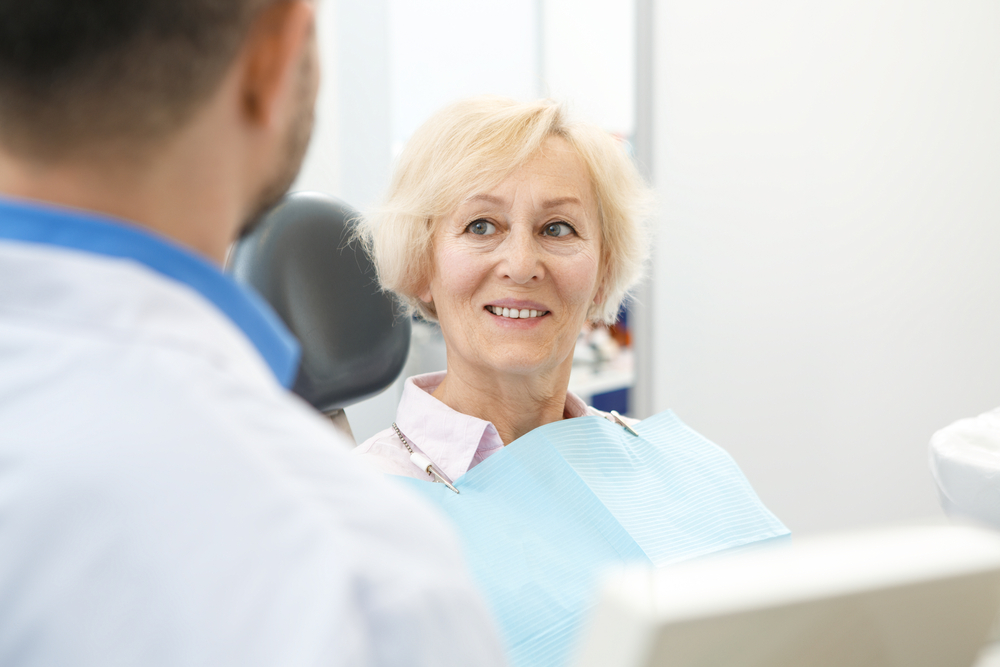 woman wanting to switch from a denture